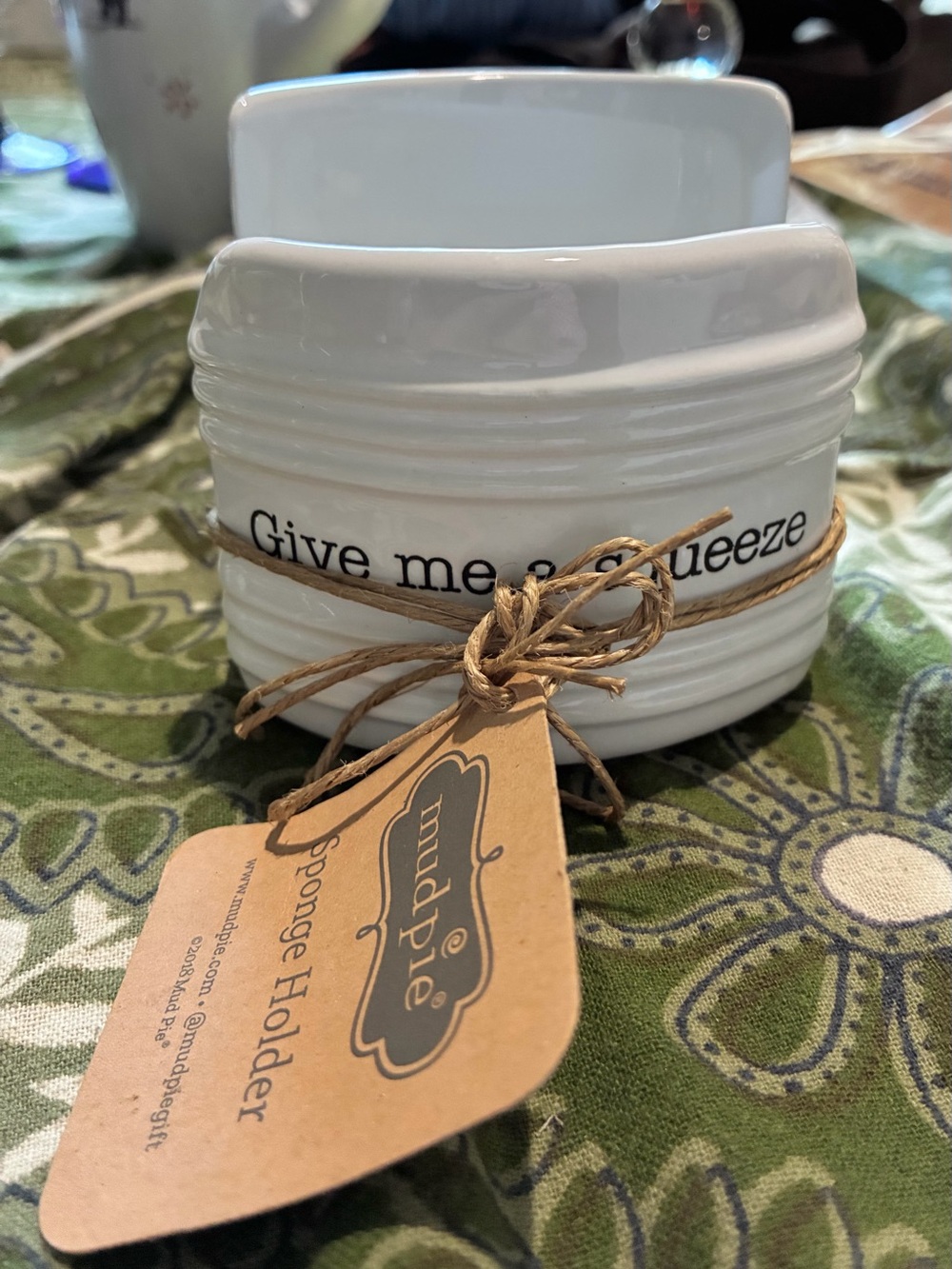 Mudpie “Give Me A Squeeze” Sponge Holder. NWT Dilliards. White w/Black Letters.